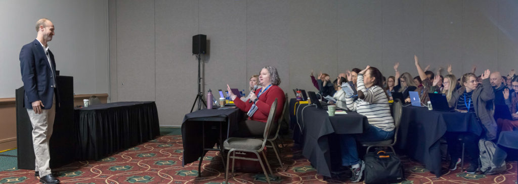 Brian Piper presenting about content strategy and SEO at a conference